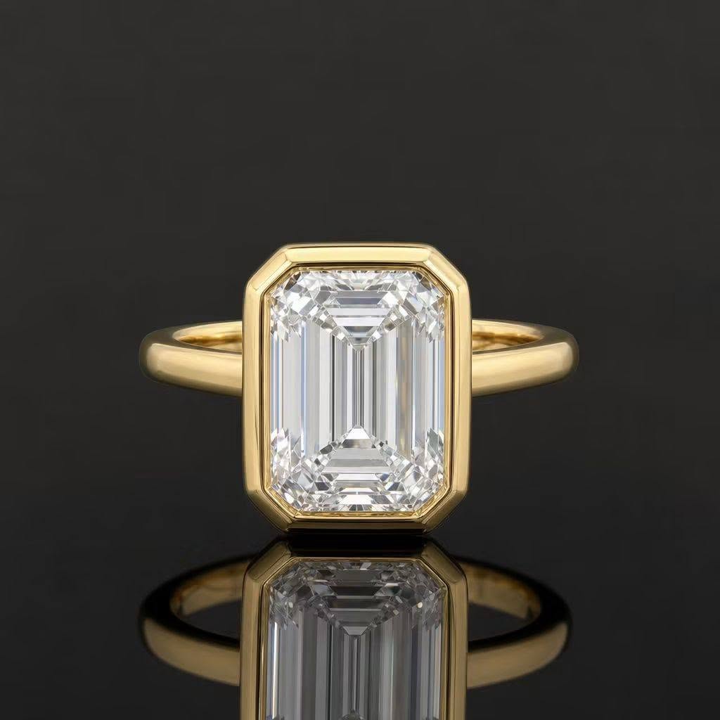 Solid 14k Gold Emerald Cut Bezel set Solitaire