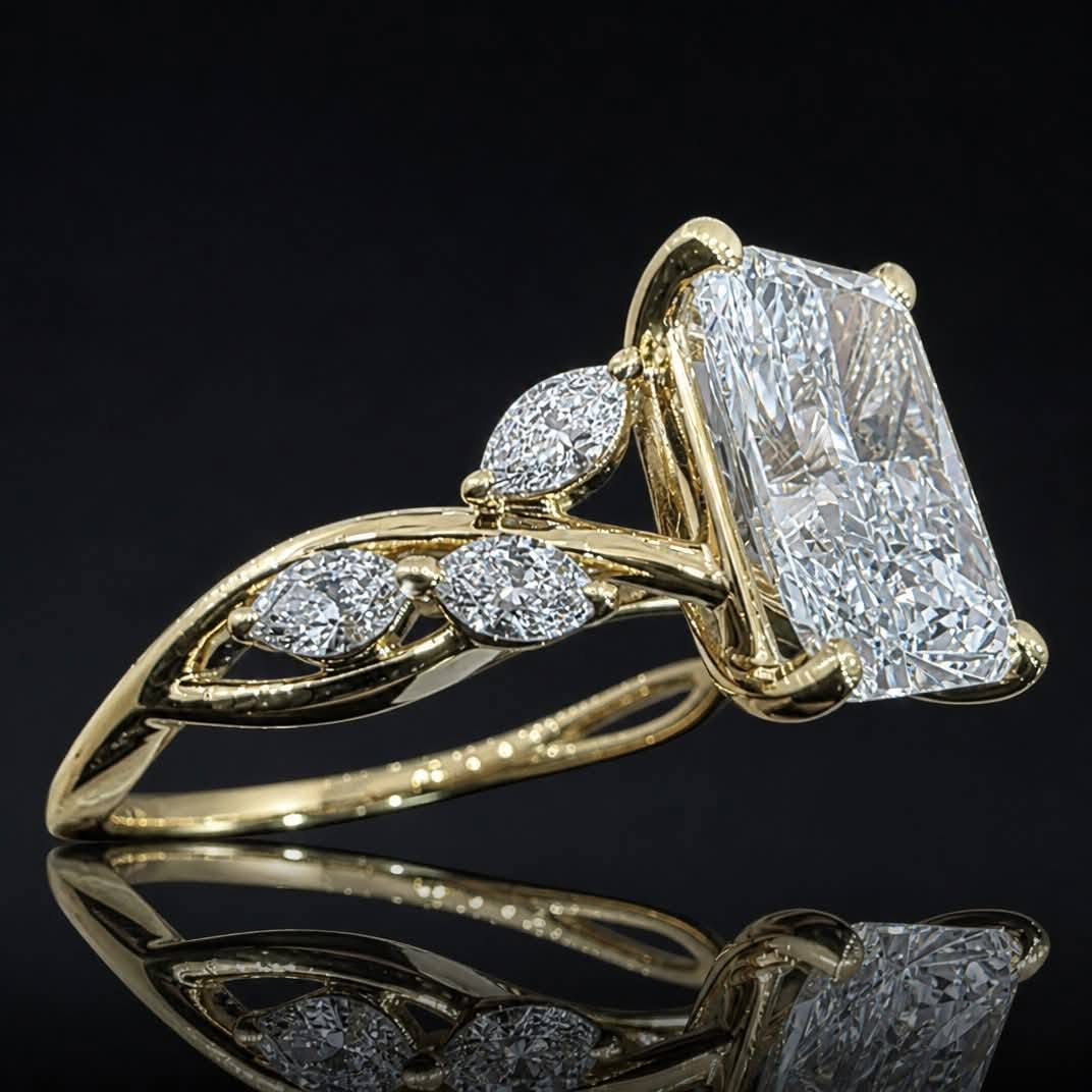 4KY 2.50ctw lab diamond twist-band ring with a radiant center and marquise side diamonds