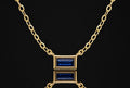 14K yellow gold necklace with a natural blue sapphire pendant